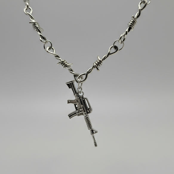 Barbed Wire Machine Gun Necklace – Gothic Streetwear Statement