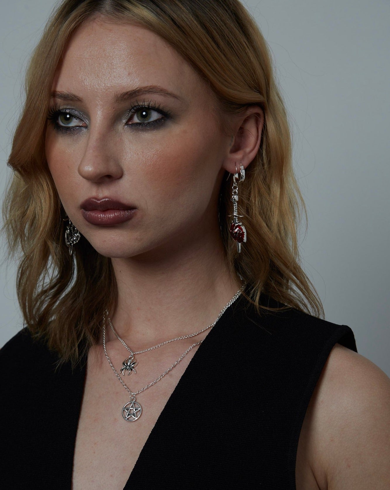 Silver and Red Anatomical Heart with Sword Charm Earrings