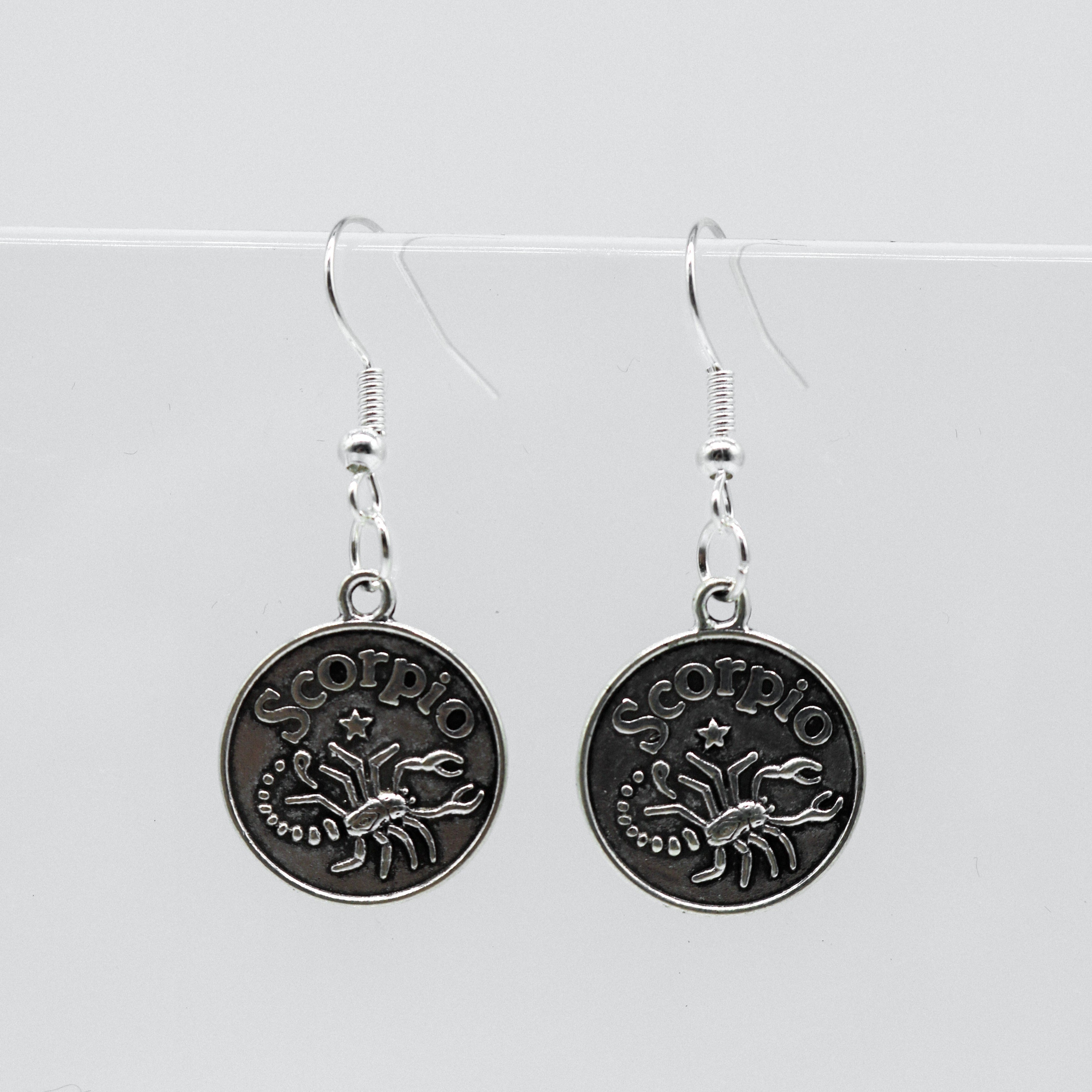 Silver Earrings With Reversible Zodiac Coin Charm