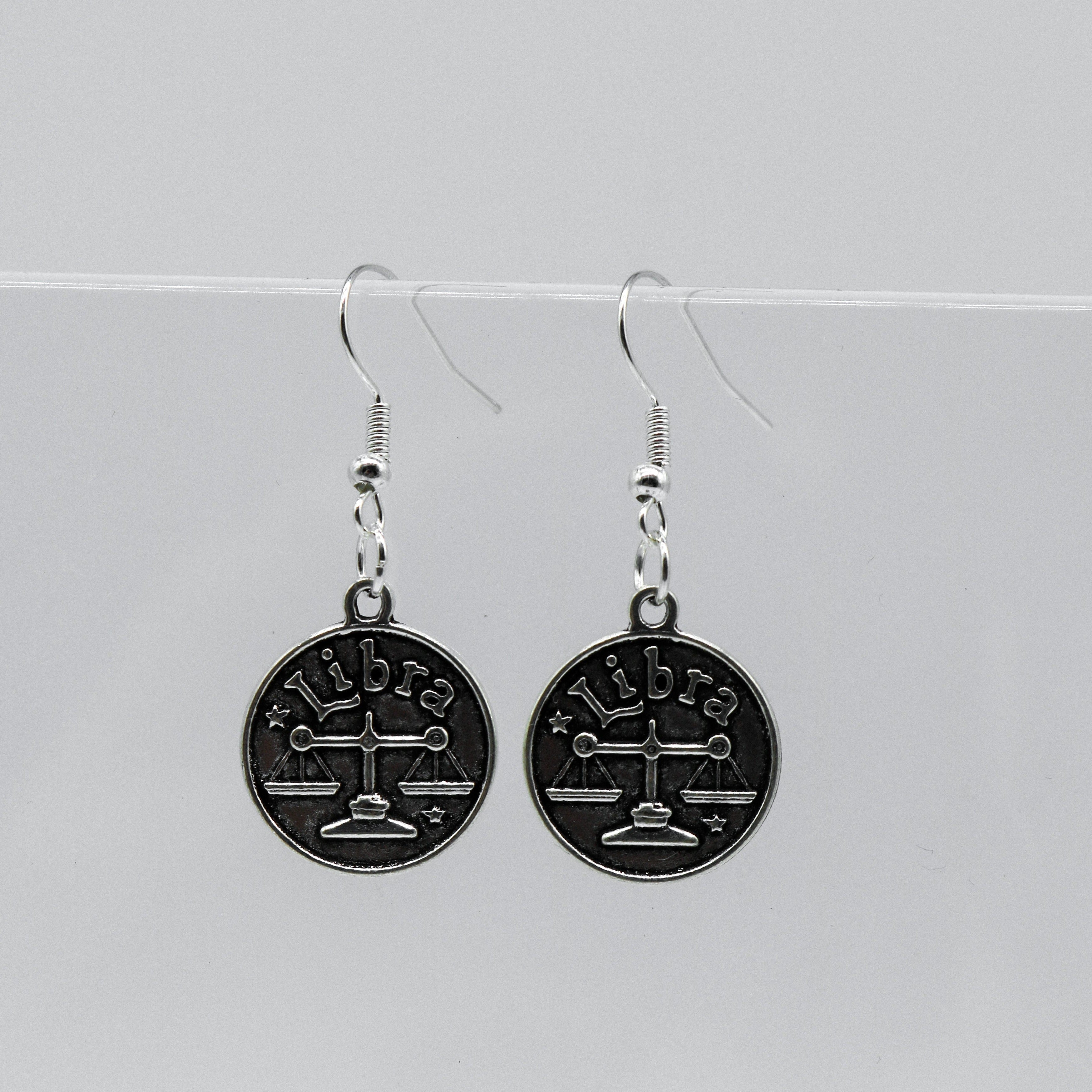 Silver Earrings With Reversible Zodiac Coin Charm