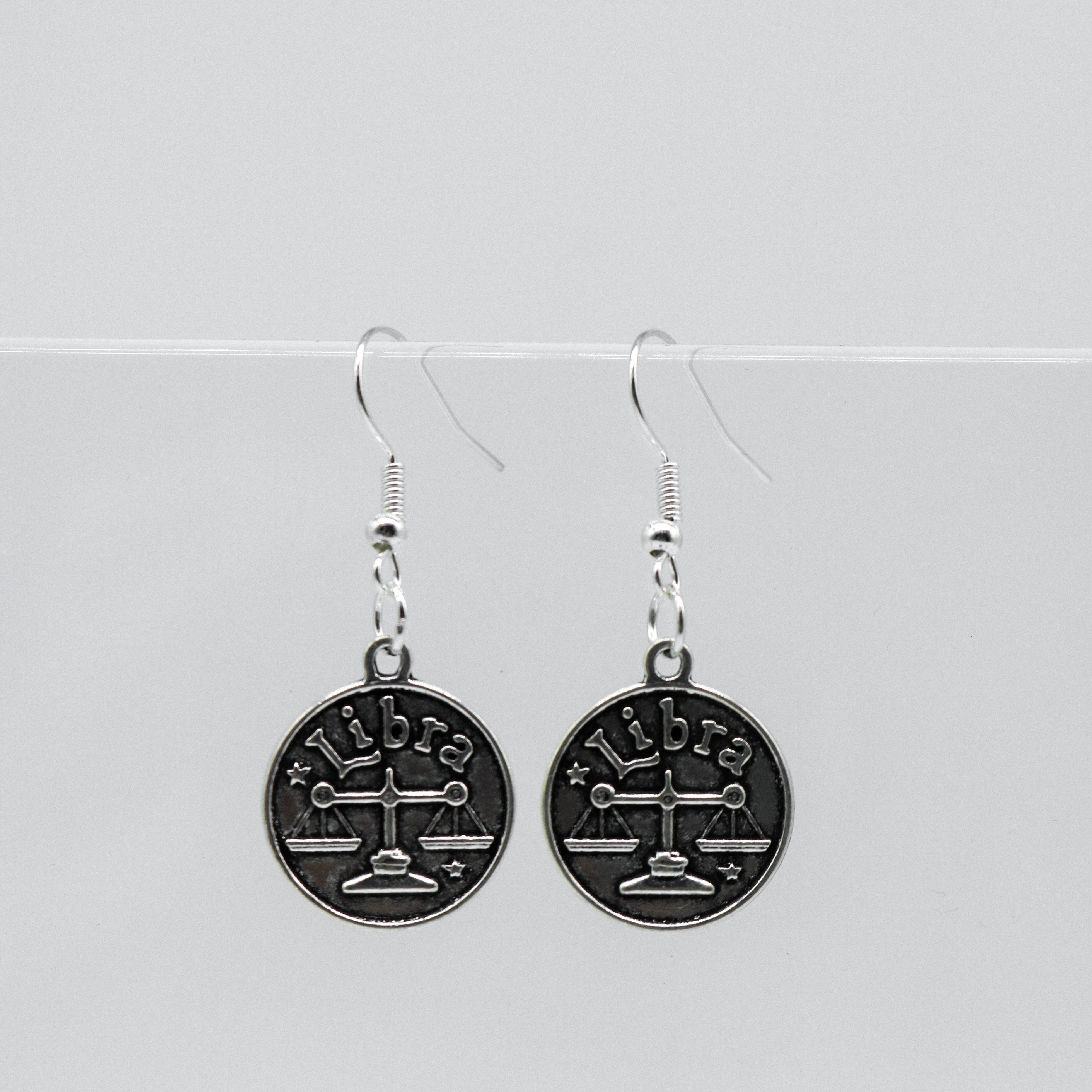 Silver Earrings With Reversible Zodiac Coin Charm