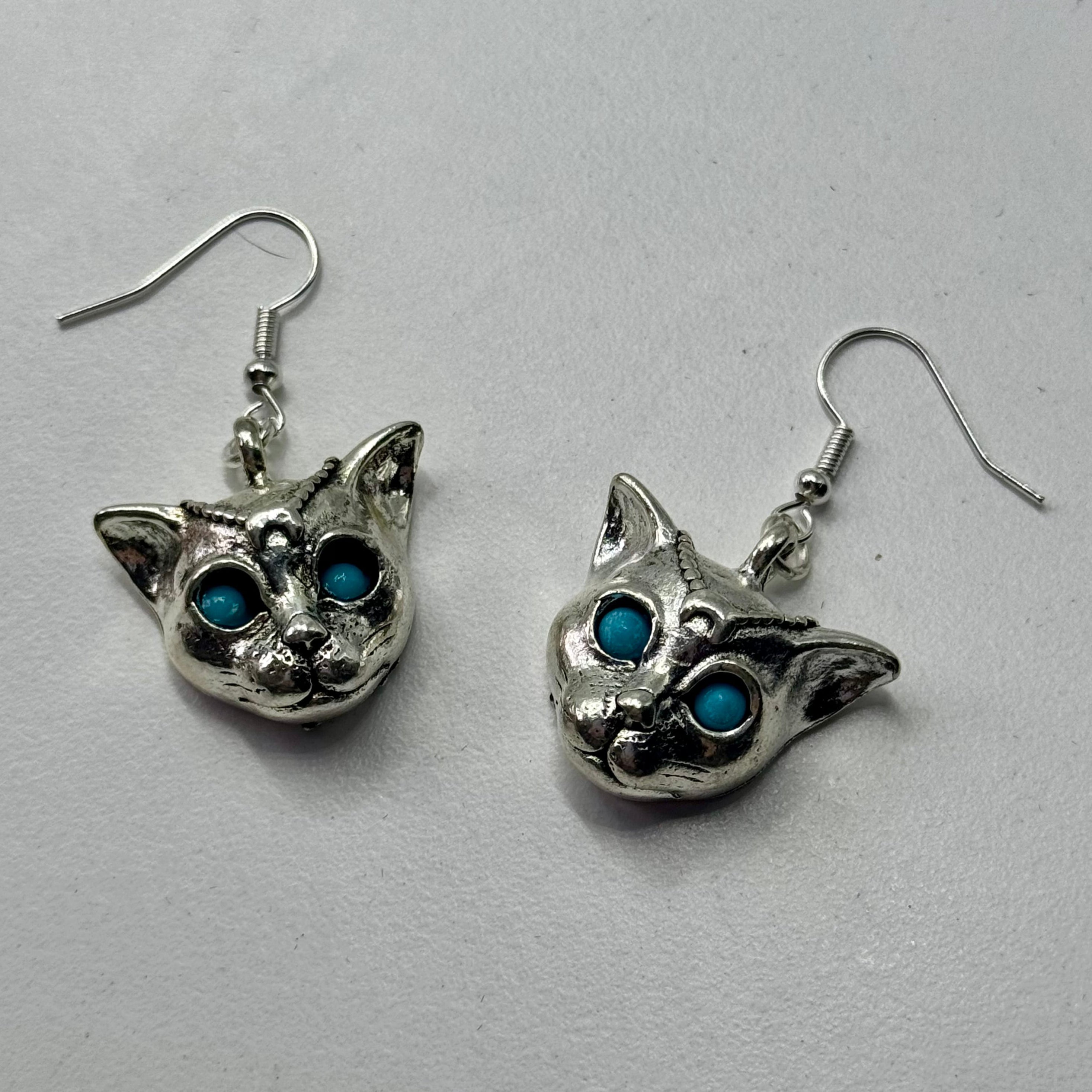 Silver Mystic Blue Eyed Leopard Charm Earrings